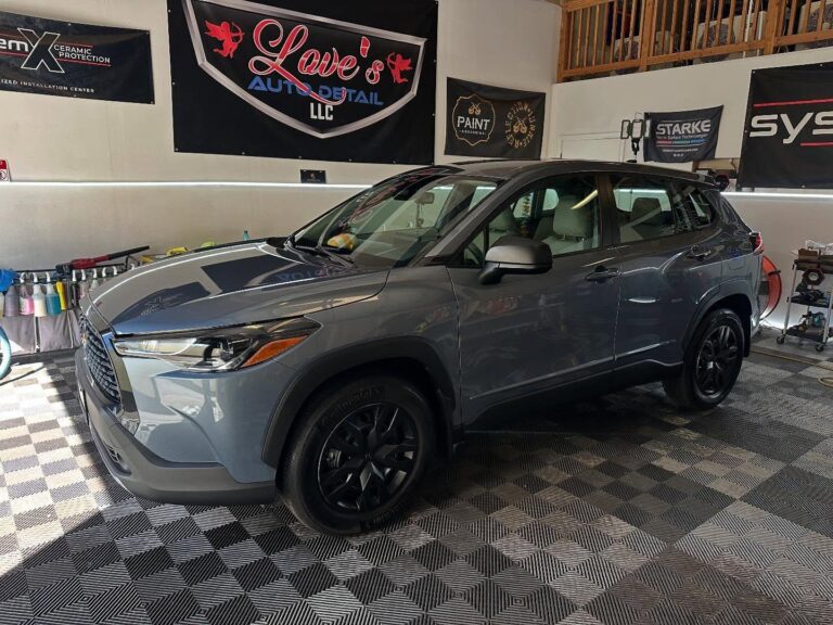 Grey Toyota SUV parked inside an auto detail shop | auto detailing | Love’s Auto Detail